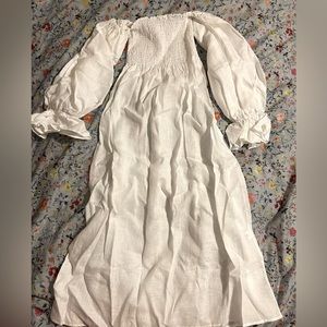 Sleeper Atlanta Smocked Linen Dress with related hair bow in white. Size M.